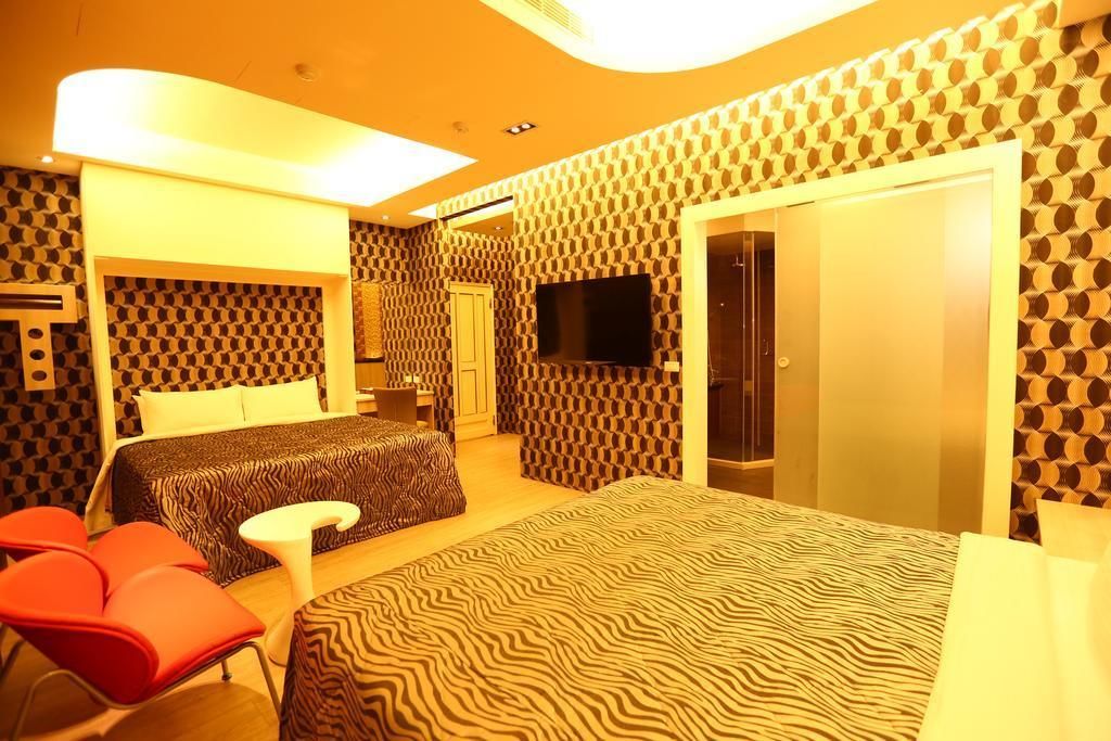 deluxe quadruple room | in-room safe, blackout curtains, soundproofing, free wifi