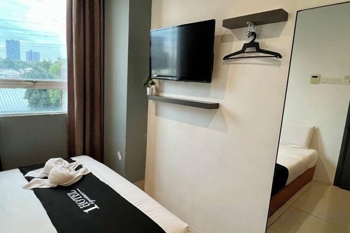 Iron/ironing board (on request), WiFi (free), bed sheets