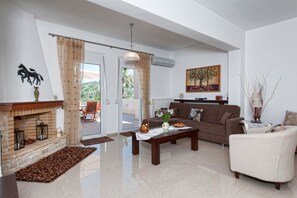 Villa, 4 Bedrooms, Private Pool, Sea View | Living room | TV, fireplace - Diogenis Home (Rethymno)