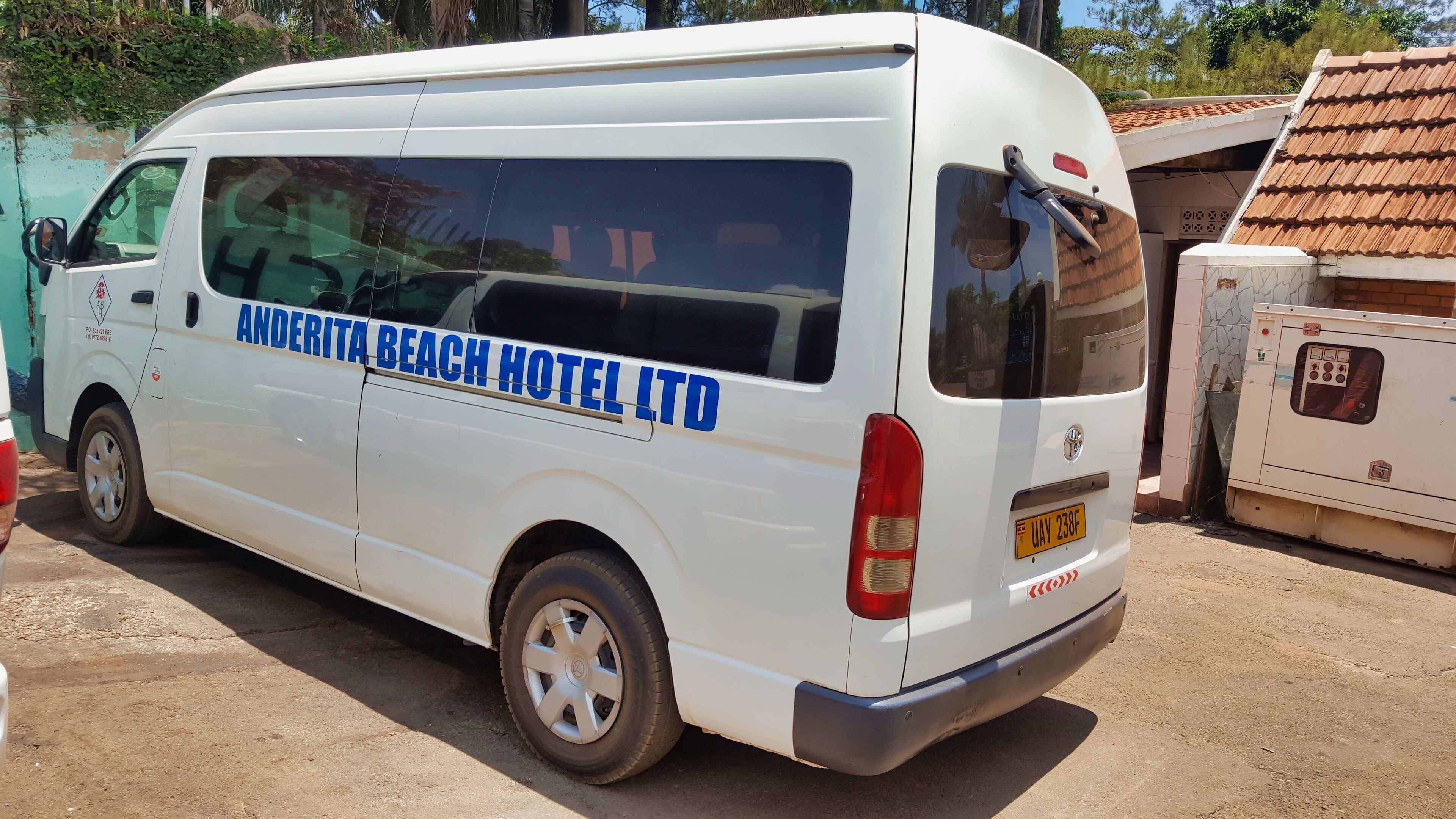 A white van with "ANDERITA BEACH HOTEL LTD" written on the side.