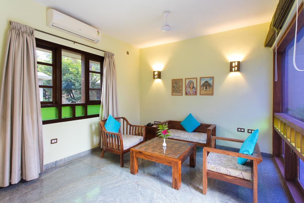 villa, private pool | living room | flat-screen tv