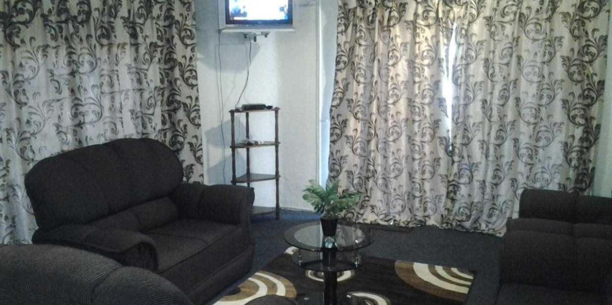 Deluxe Apartment, 1 Bedroom | Living room | Flat-screen TV, DVD player