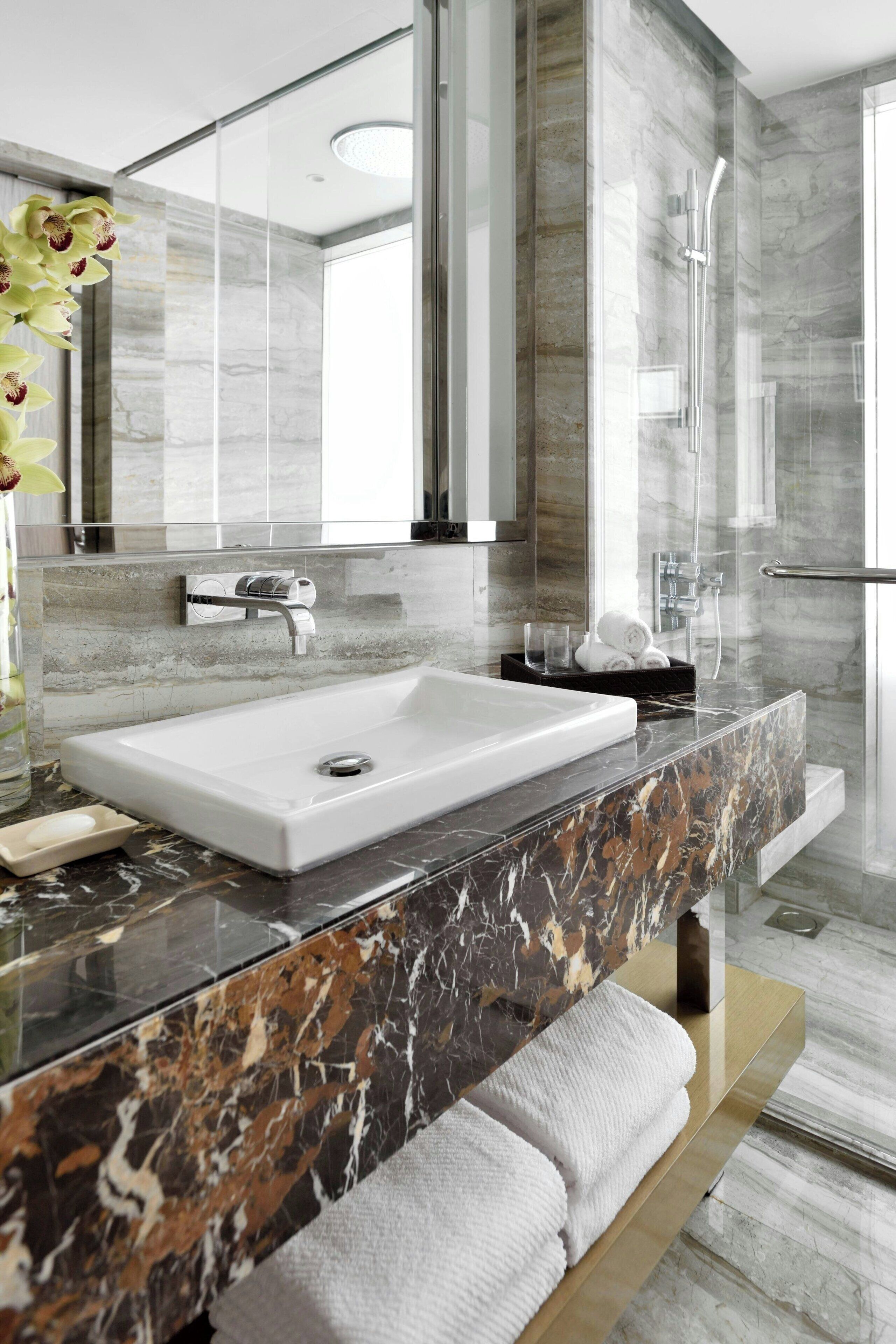 rainfall showerhead, designer toiletries, hair dryer, bathrobes