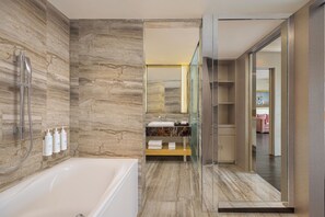 Suite, 1 Bedroom, Park View | Bathroom | Rainfall showerhead, designer toiletries, hair dryer, bathrobes