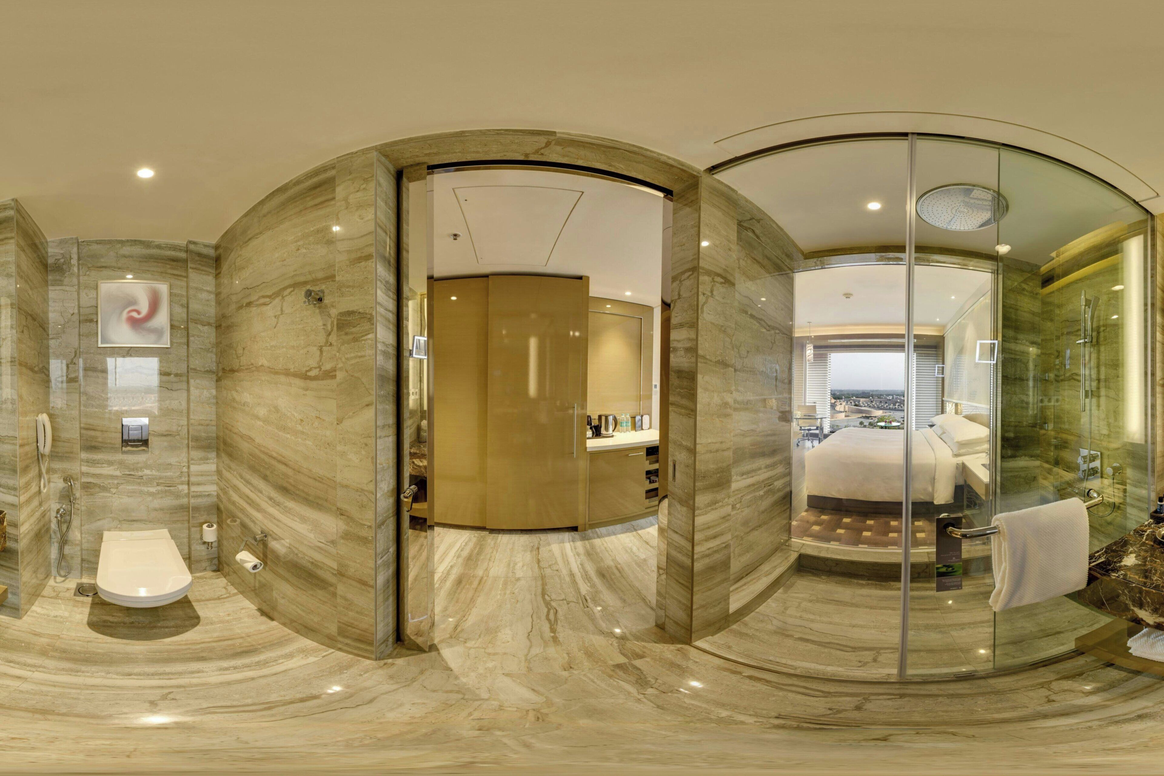 room, 1 king bed | bathroom | rainfall showerhead, designer toiletries, hair dryer, bathrobes