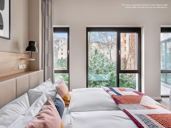 Suite Familiale, vue cour intérieure | Vue de la chambre