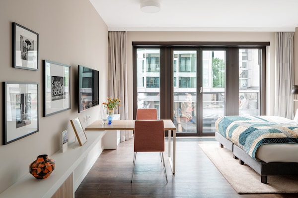 Superior studio | Luxe beddengoed, donsdekens, een kluis op de kamer