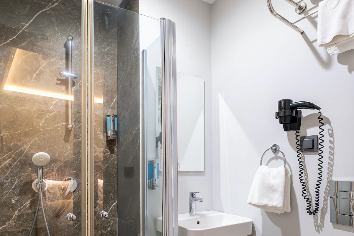 Shower, rainfall showerhead, hair dryer, slippers