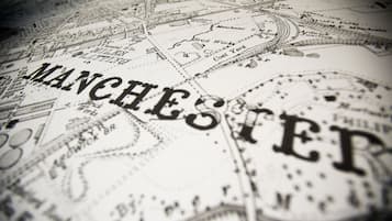 A detailed map of Manchester with labeled streets and landmarks.
