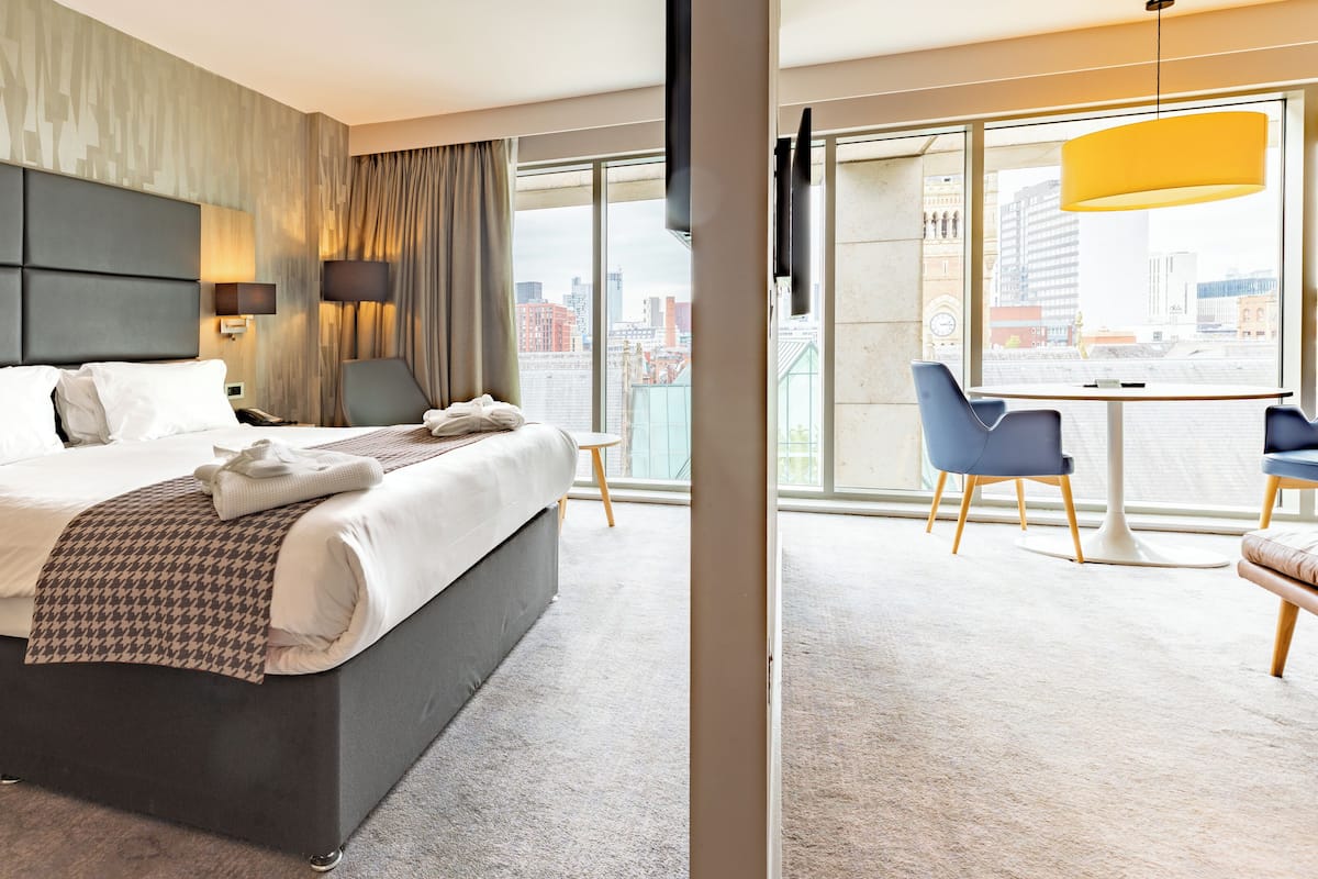 Suite, 1 King Bed with Sofa bed, City View | Hypo-allergenic bedding, in-room safe, individually decorated