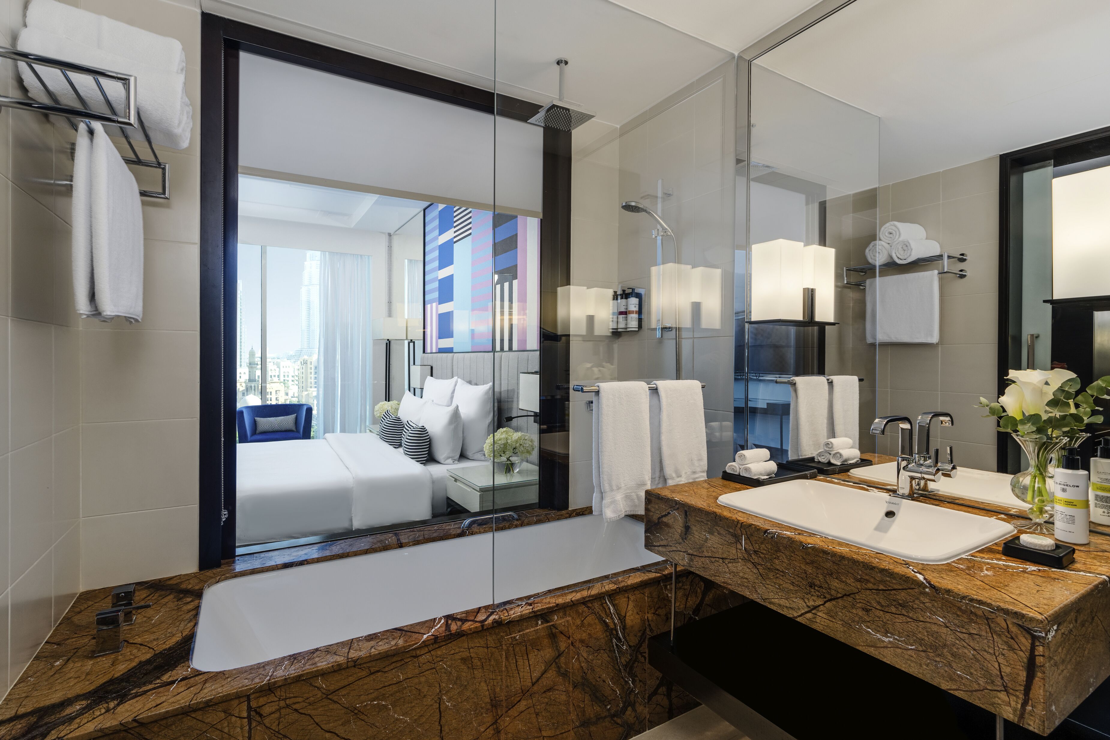 combined shower/bathtub, rainfall showerhead, designer toiletries