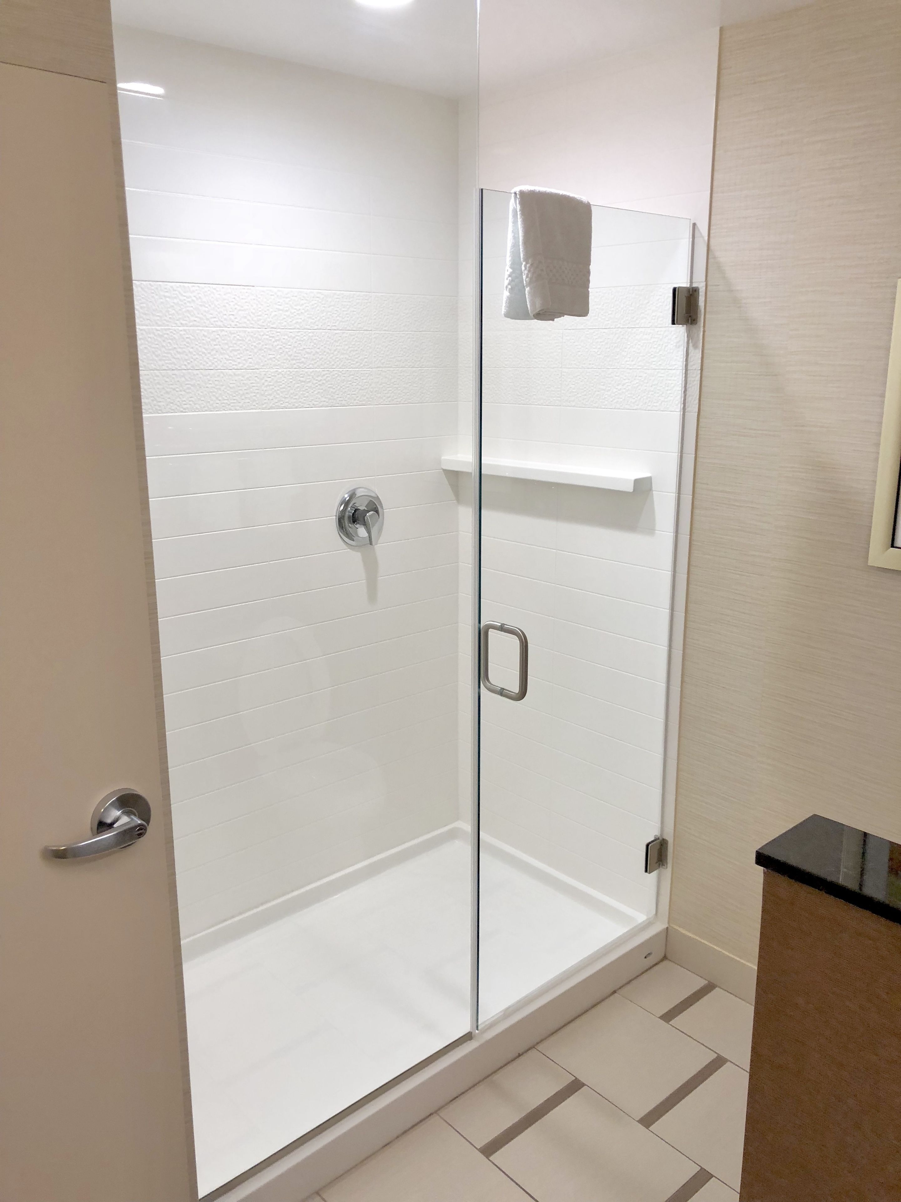 combined shower/bathtub, free toiletries, hair dryer, towels