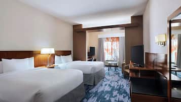 Suite ejecutiva, varias camas | Ropa de cama de alta calidad y caja de seguridad en la habitación