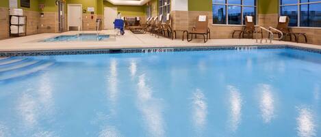 Indoor pool, open 6:00 AM to 11:00 PM, pool loungers