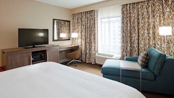 Premium bedding, down comforters, blackout drapes, iron/ironing board