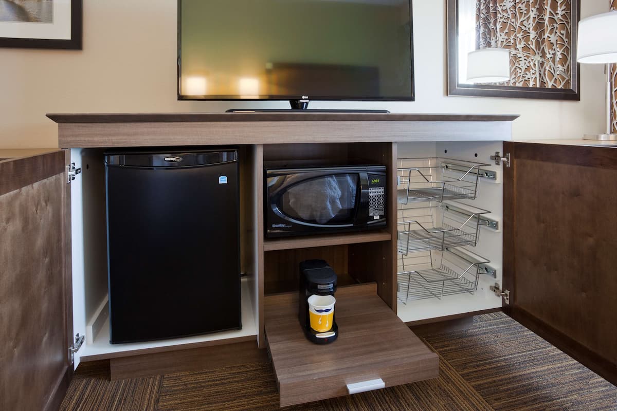 premium bedding, down duvets, blackout curtains, iron/ironing board