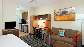 Studio, 1 King Bed with Sofa bed | Living area | TV