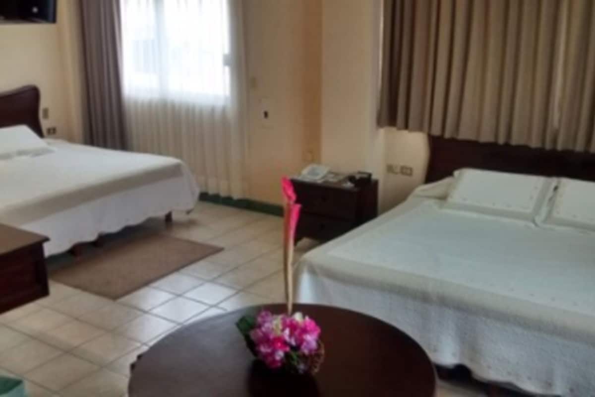 Suíte júnior, 2 camas de casal | Roupas de cama premium, Wi-Fi de cortesia, roupa de cama