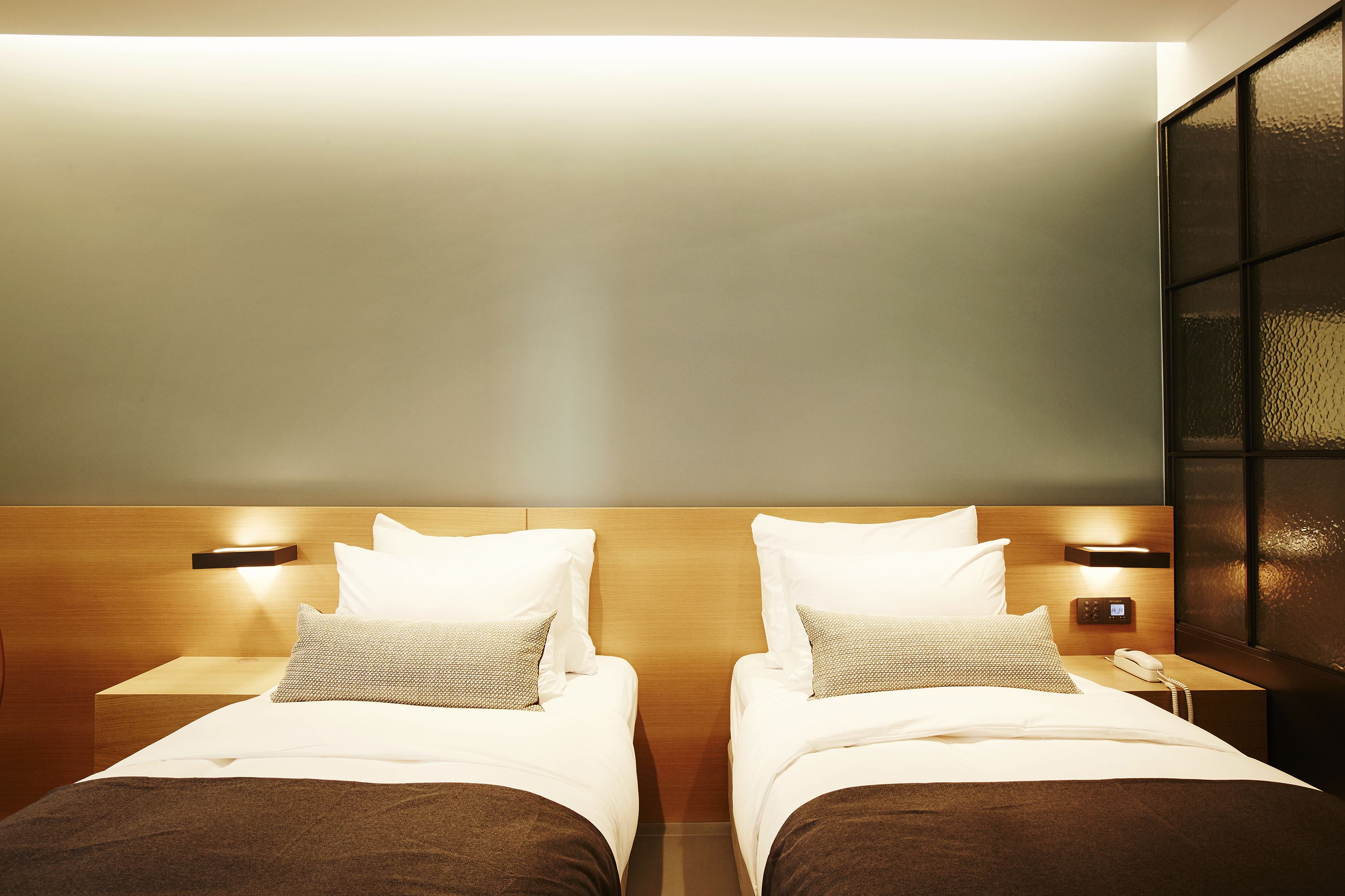 superior twin room with shower | in-room safe, desk, blackout curtains, iron/ironing board