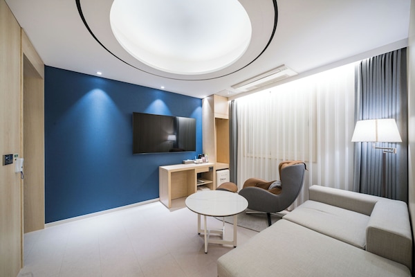 Down comforters, blackout drapes, soundproofing, free WiFi