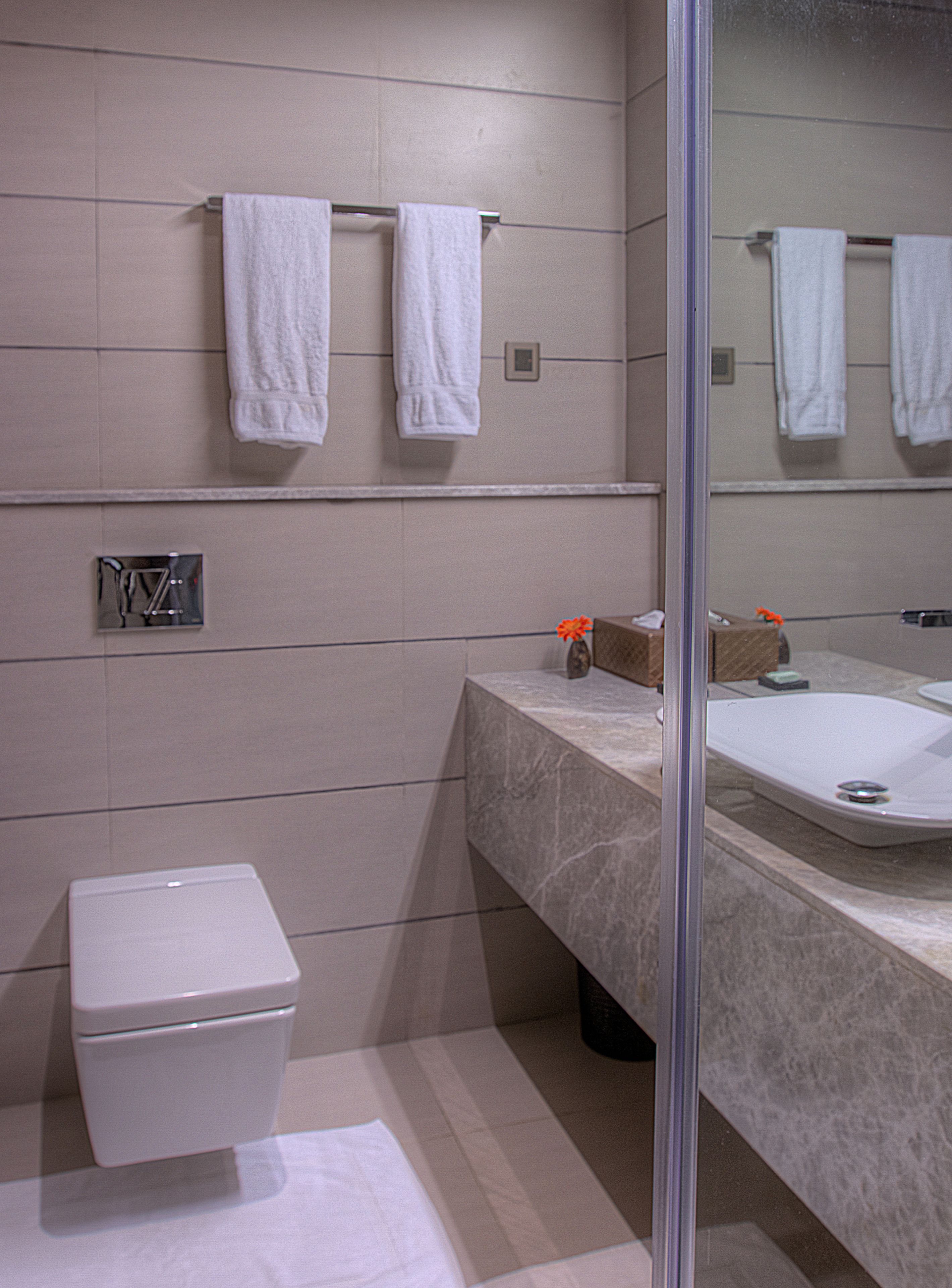 attic deluxe lake view - le vallon | bathroom | shower, free toiletries, hair dryer, bathrobes