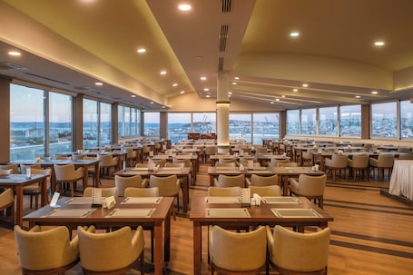 2 restaurants; breakfast, lunch and dinner served . Parion Hotel