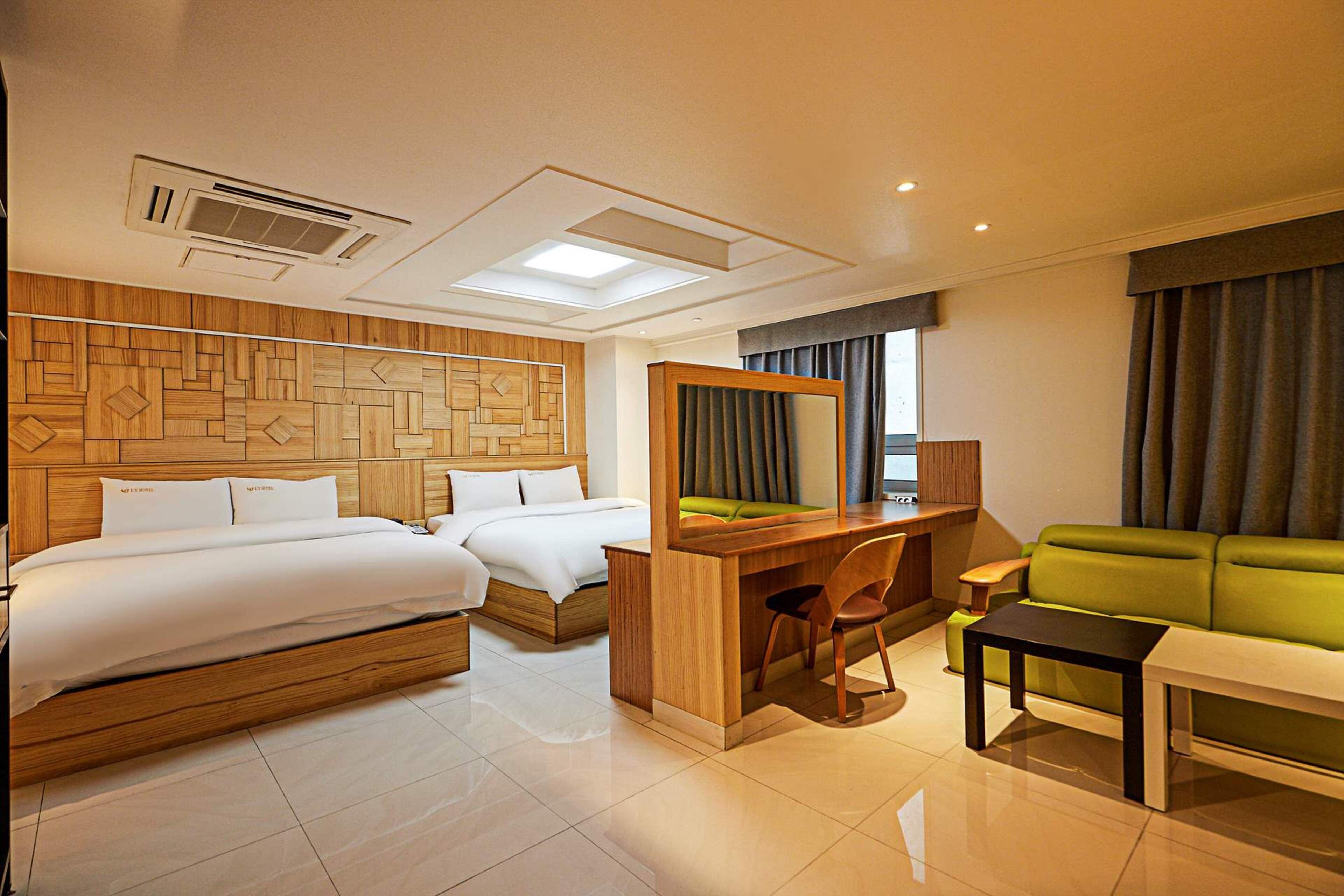 Premium bedding, down comforters, memory foam beds, free minibar