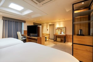 Premium bedding, down duvets, memory-foam beds, free minibar