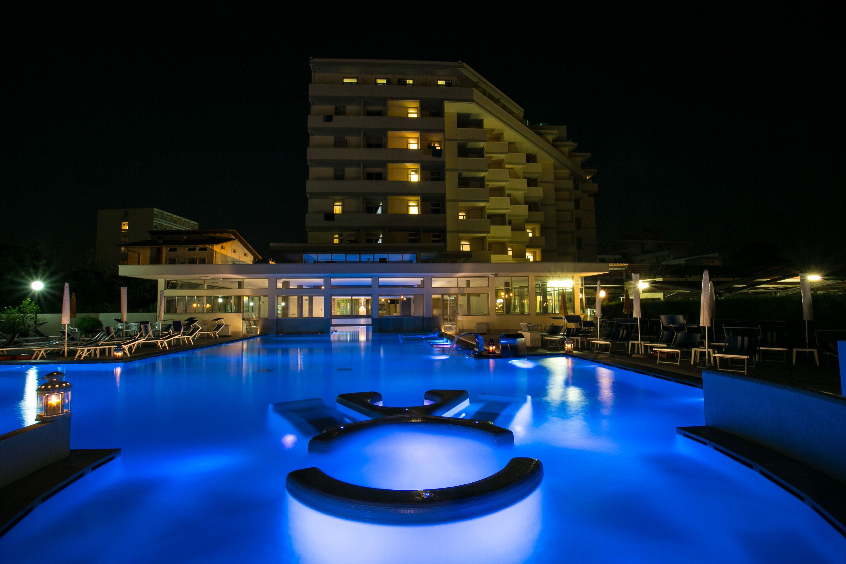 indoor pool, seasonal outdoor pool, pool umbrellas, pool loungers