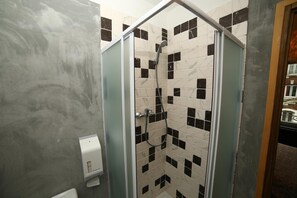 Shower, free toiletries, hair dryer, towels