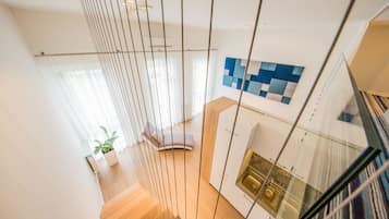 Studio Suite (Coconut) | Living area | Flat-screen TV, DVD player