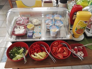 Fresh produce and dairy products are available for guests to enjoy.