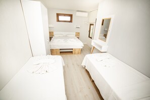 Economy Quadruple Room | Premium bedding, desk, blackout drapes, soundproofing - Limonata Assos (Ayvacik)