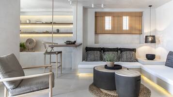 Unique Suite, Private Pool | Living area | 40-inch flat-screen TV with satellite channels, TV