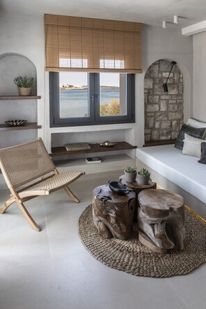 Breeze Suite with outdoor plunge pool | Living area | 40-inch flat-screen TV with satellite channels, TV - The Sand Suites - Adults Only (Agios Nikolaos)