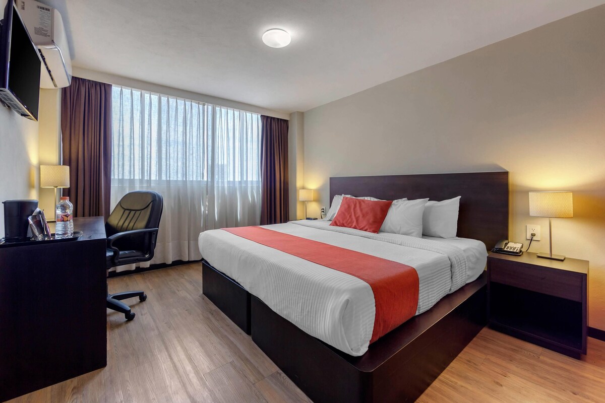 Hypo-allergenic bedding, in-room safe, desk, alarm clocks