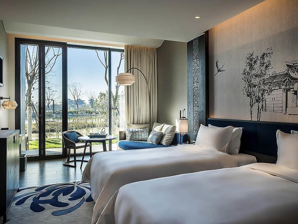 Habitación Deluxe, 2 camas individuales, vista al jardín | Ropa de cama de alta calidad y minibar 