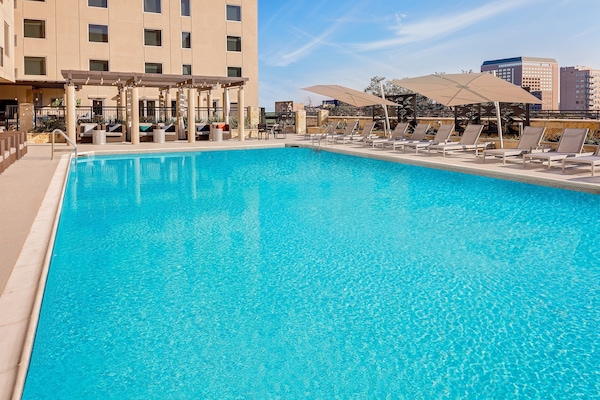 Outdoor pool, open 7:00 AM to 10:00 PM, pool cabanas (surcharge)