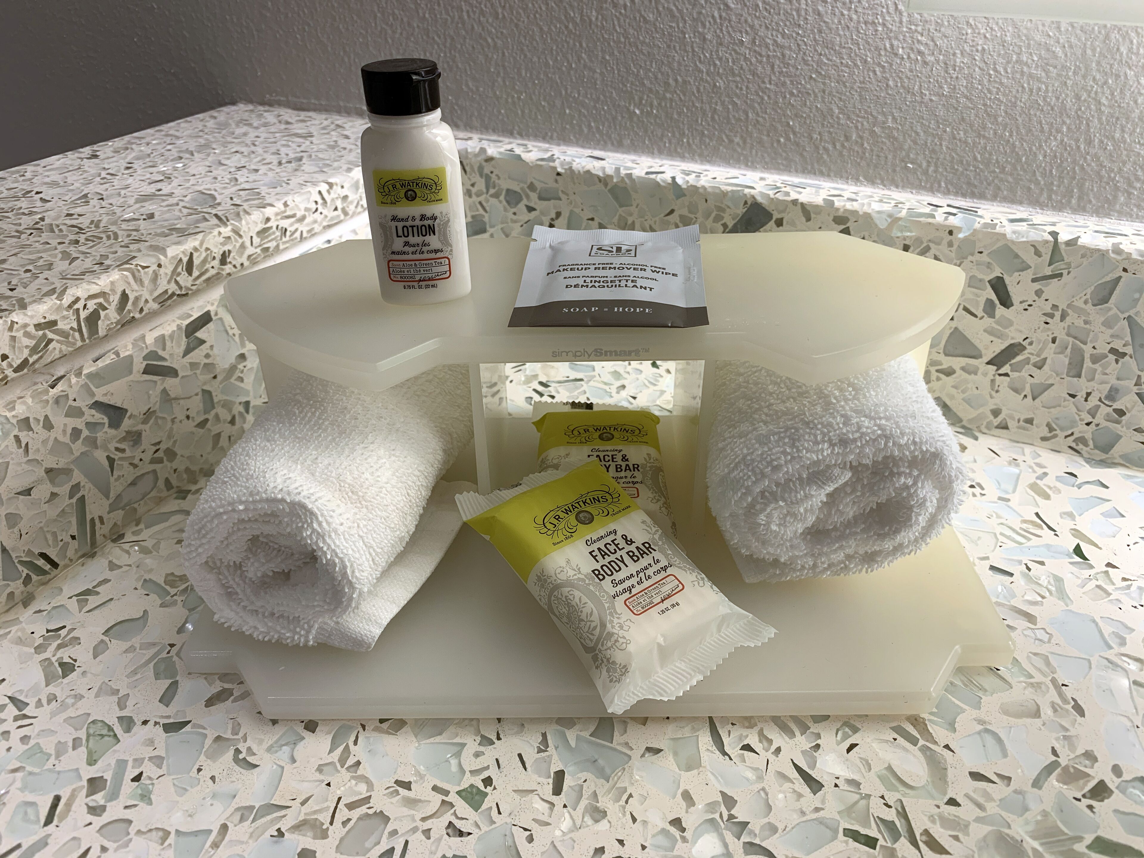 combined shower/bathtub, designer toiletries, hair dryer, towels