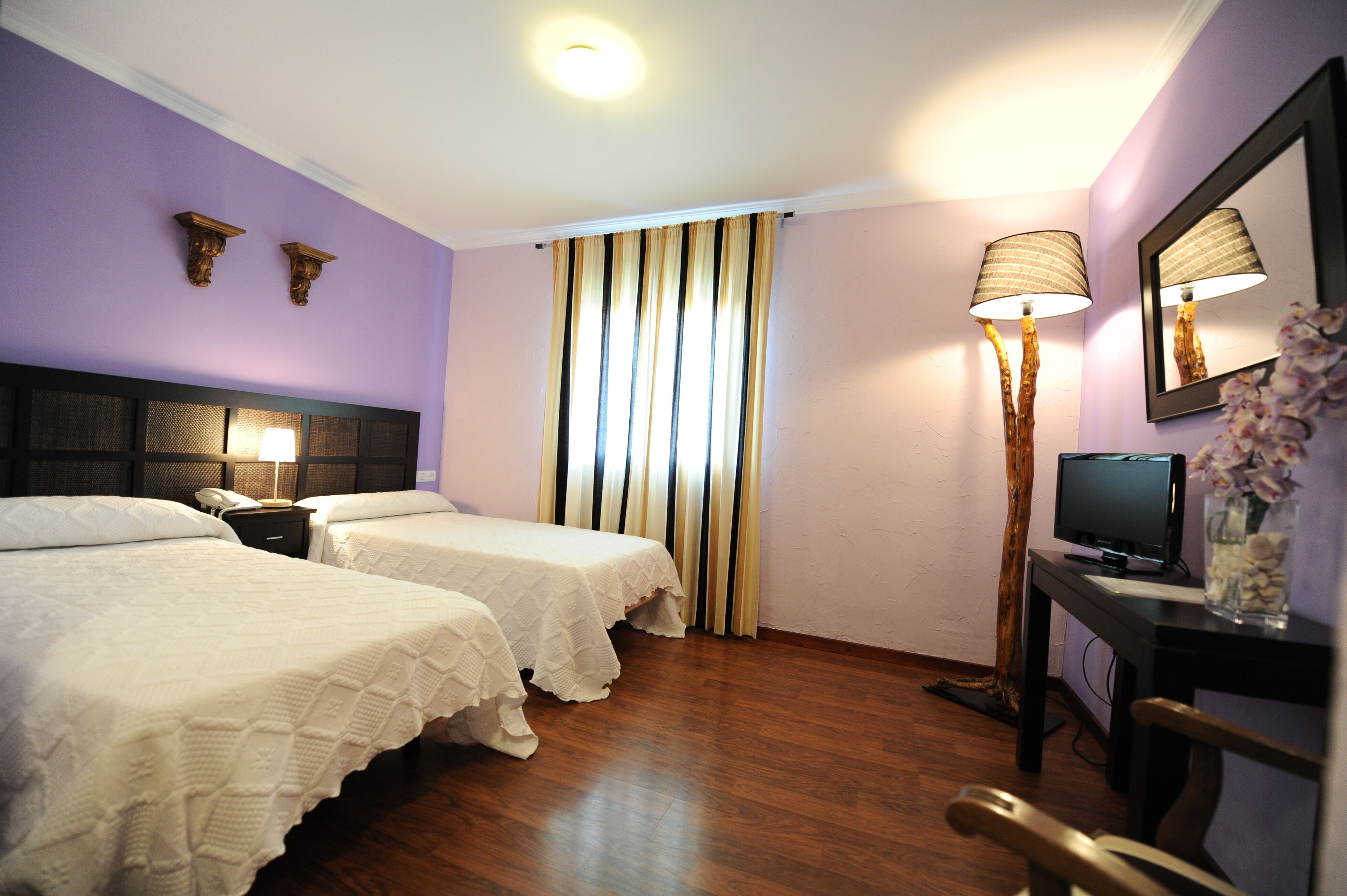 premium bedding, desk, blackout curtains, iron/ironing board