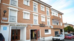 A hotel named "HOTEL MONTEAROMA" with a sign for "OTTAWA" and a visible entrance.