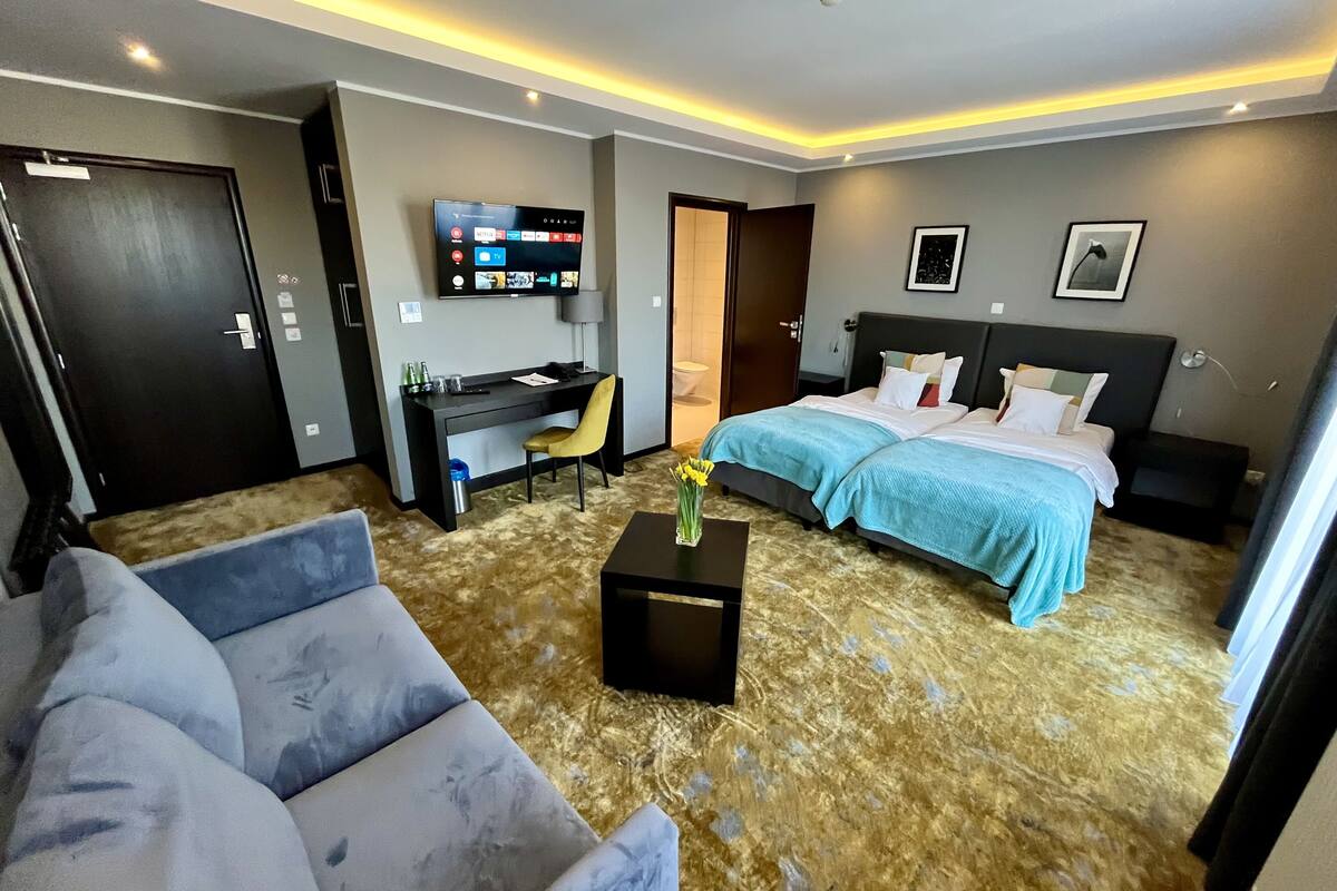 superior room | living area | led tv