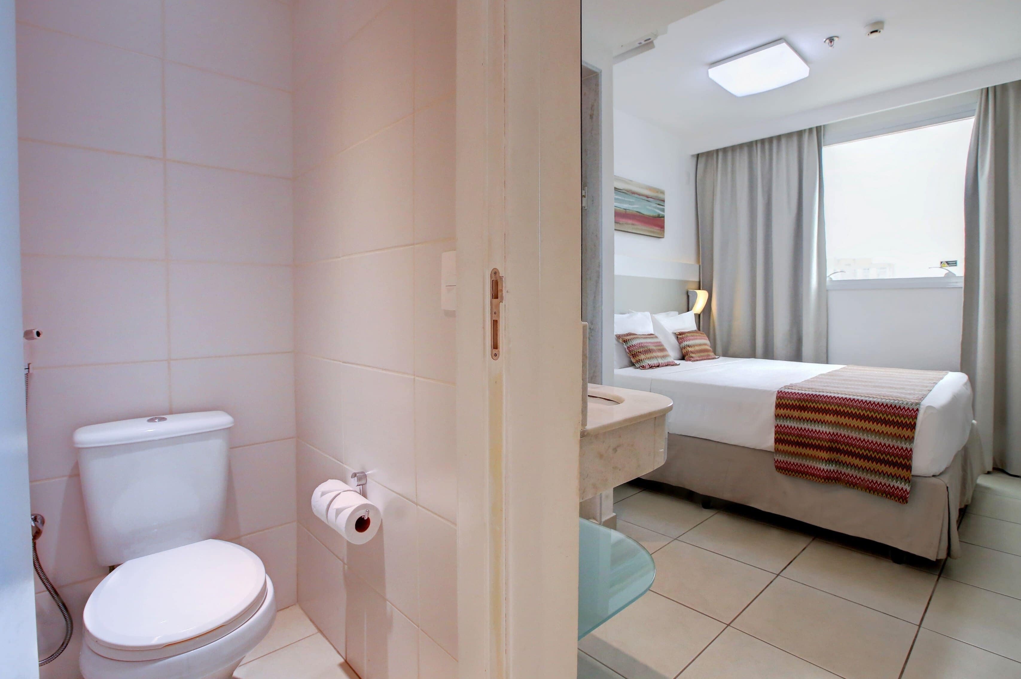 standard double room, 1 queen bed | bathroom | shower, free toiletries, hair dryer, towels
