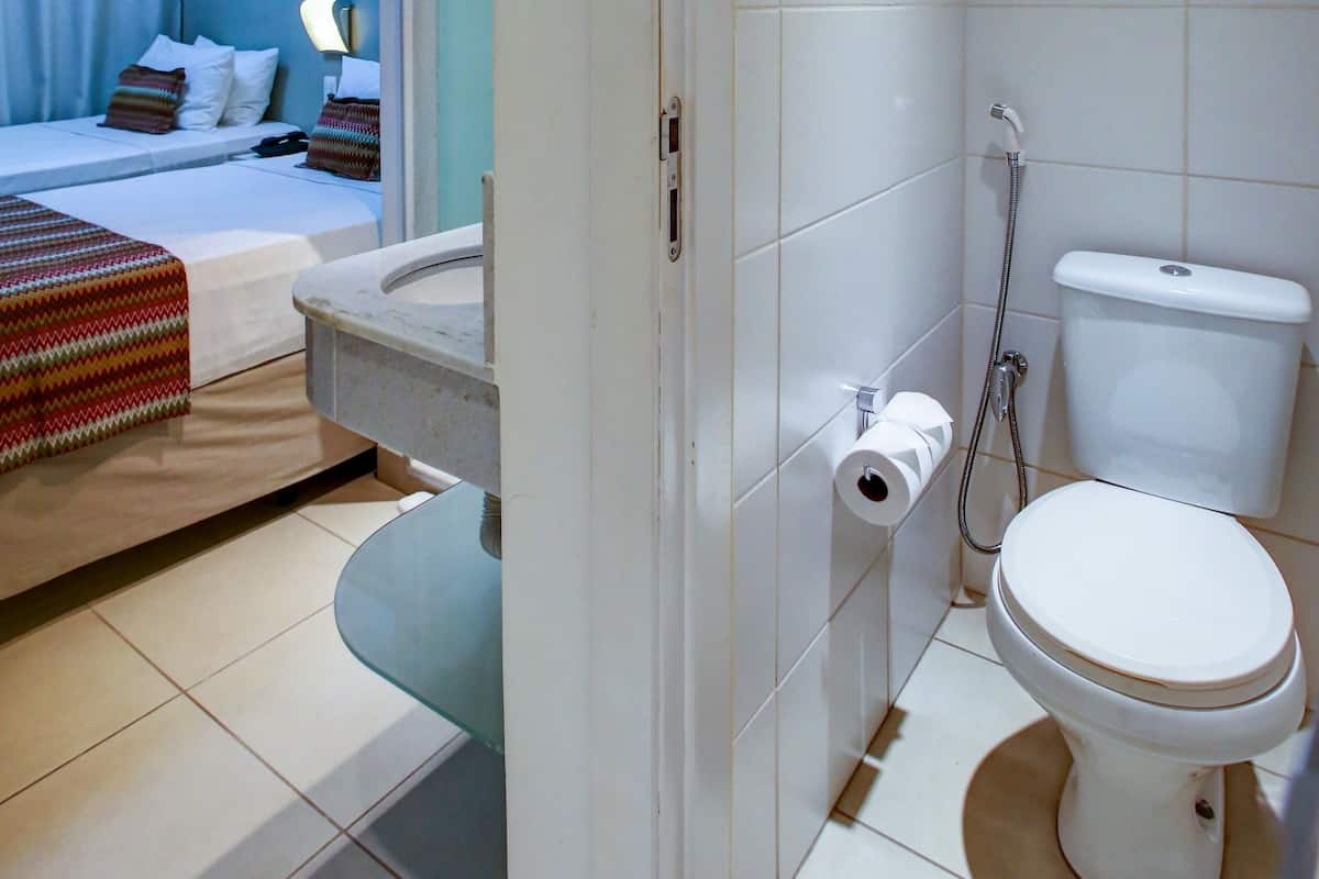 standard twin room, 2 single beds | bathroom | shower, free toiletries, hair dryer, towels