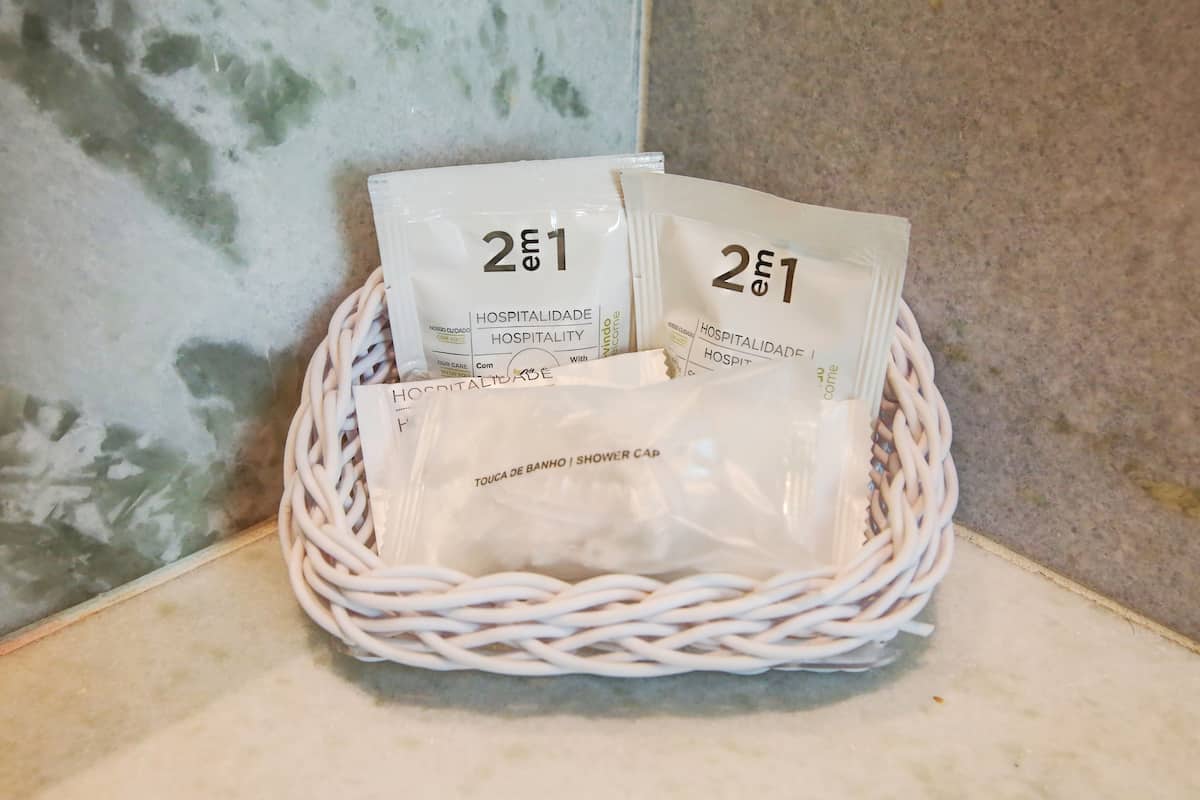 standard double room, 1 queen bed | bathroom | shower, free toiletries, hair dryer, towels