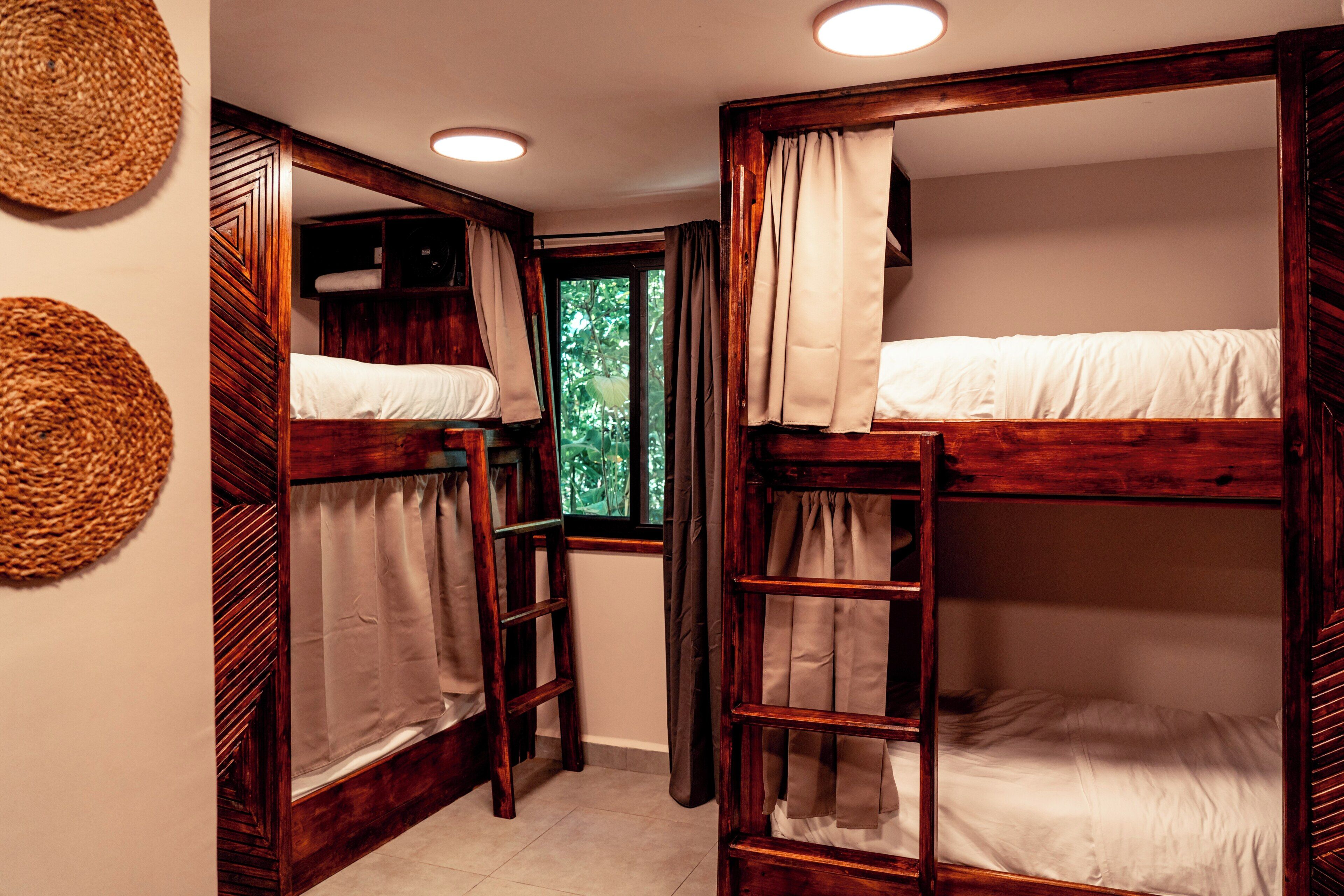 Bed in 10-Bed Dorm with AC | Capsule