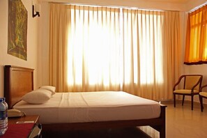 Deluxe Room, Beachside | In-room safe, desk, rollaway beds
