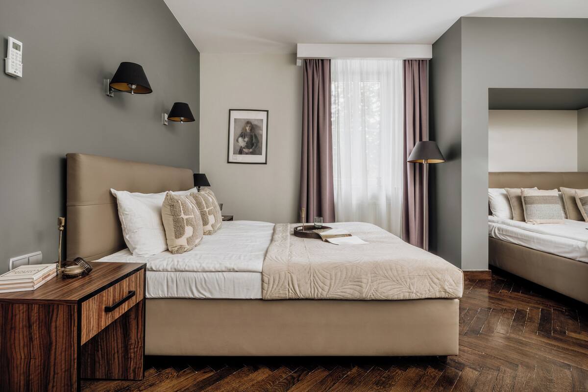 Superior Triple Room | Minibar, in-room safe, desk, iron/ironing board (on request)