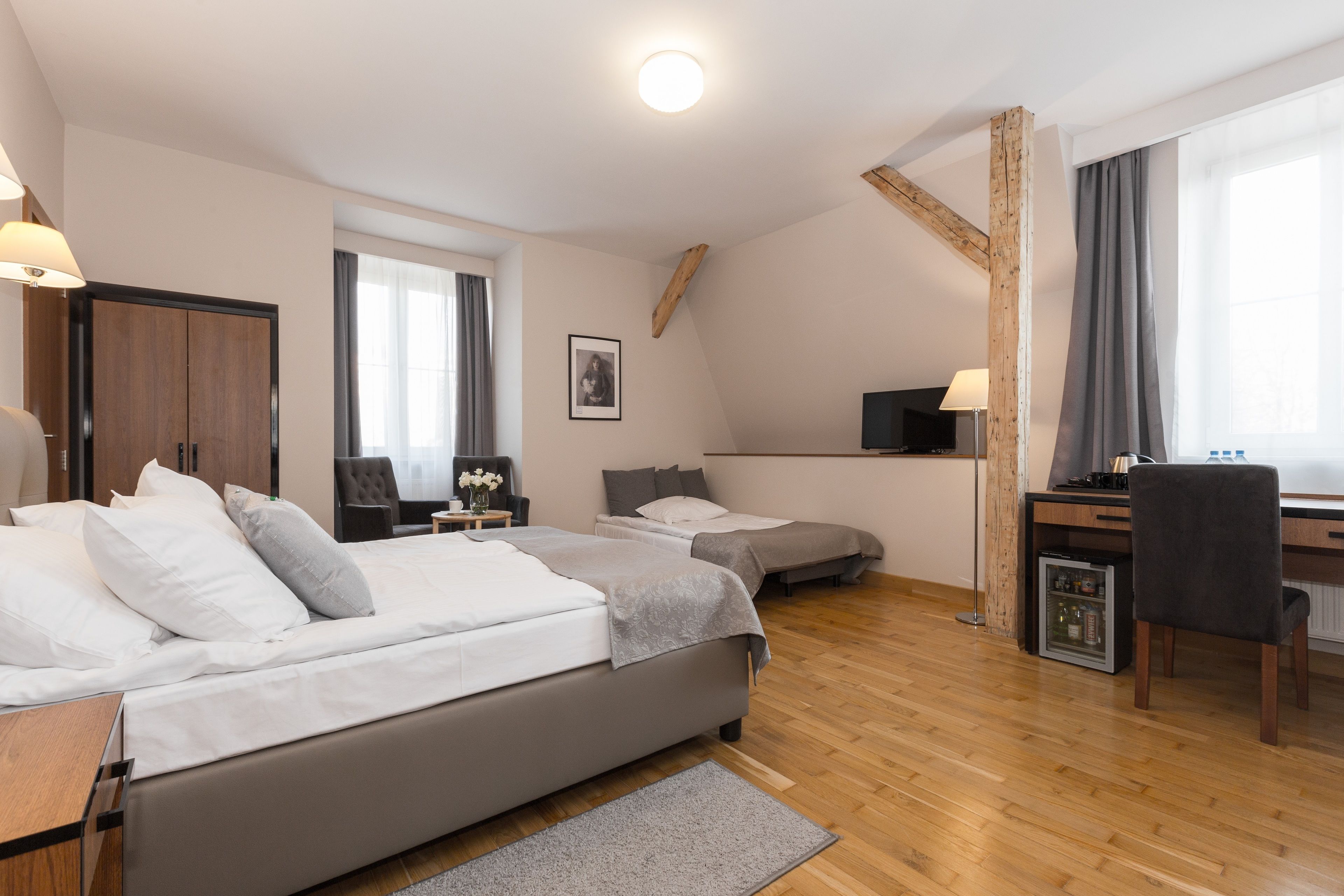 superior triple room | minibar, in-room safe, individually decorated, desk