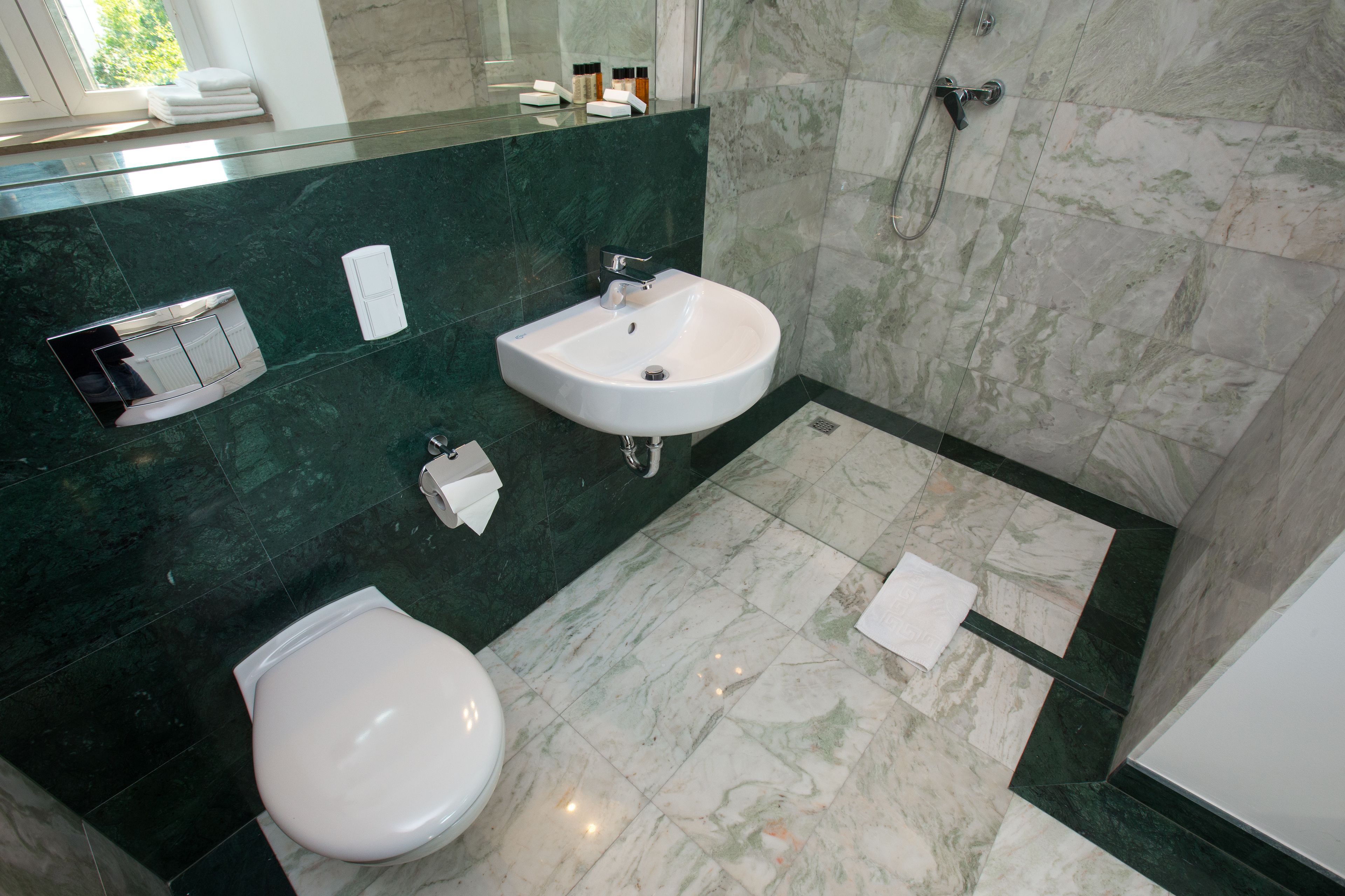 free toiletries, hair dryer, slippers, towels